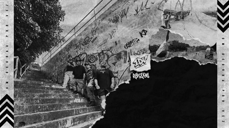 Arte do clipe Raízes: os quatro integrantes do 1DV numa escadaria grafitada, com o logo e o título Raízes